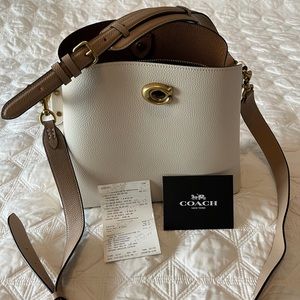 Coach purse- light beige/cream color. 2 straps, 3 compartments.